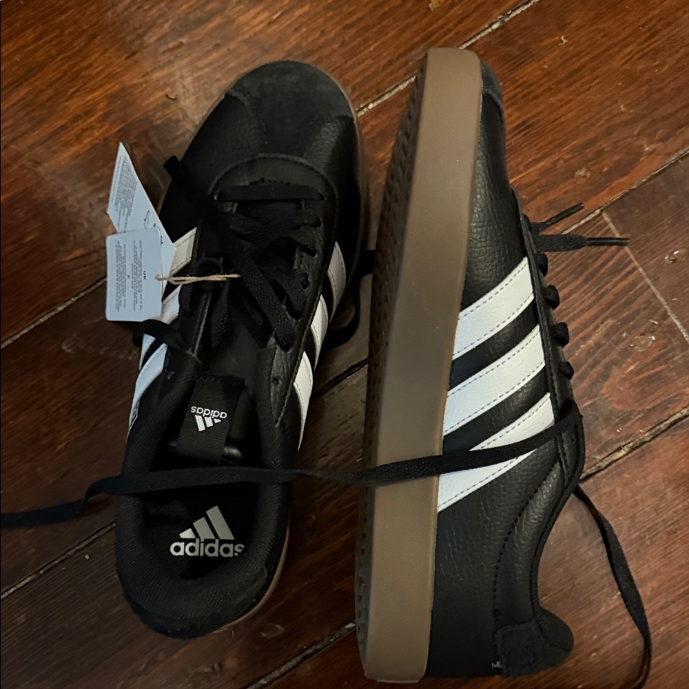 Adidas women’s Black and White Sneakers with Brown Sole